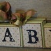 Shelf Sitter Shabby Chic Wood Blocks BABY tied up with ribbon and bow Blocks are loose and can be stacked
