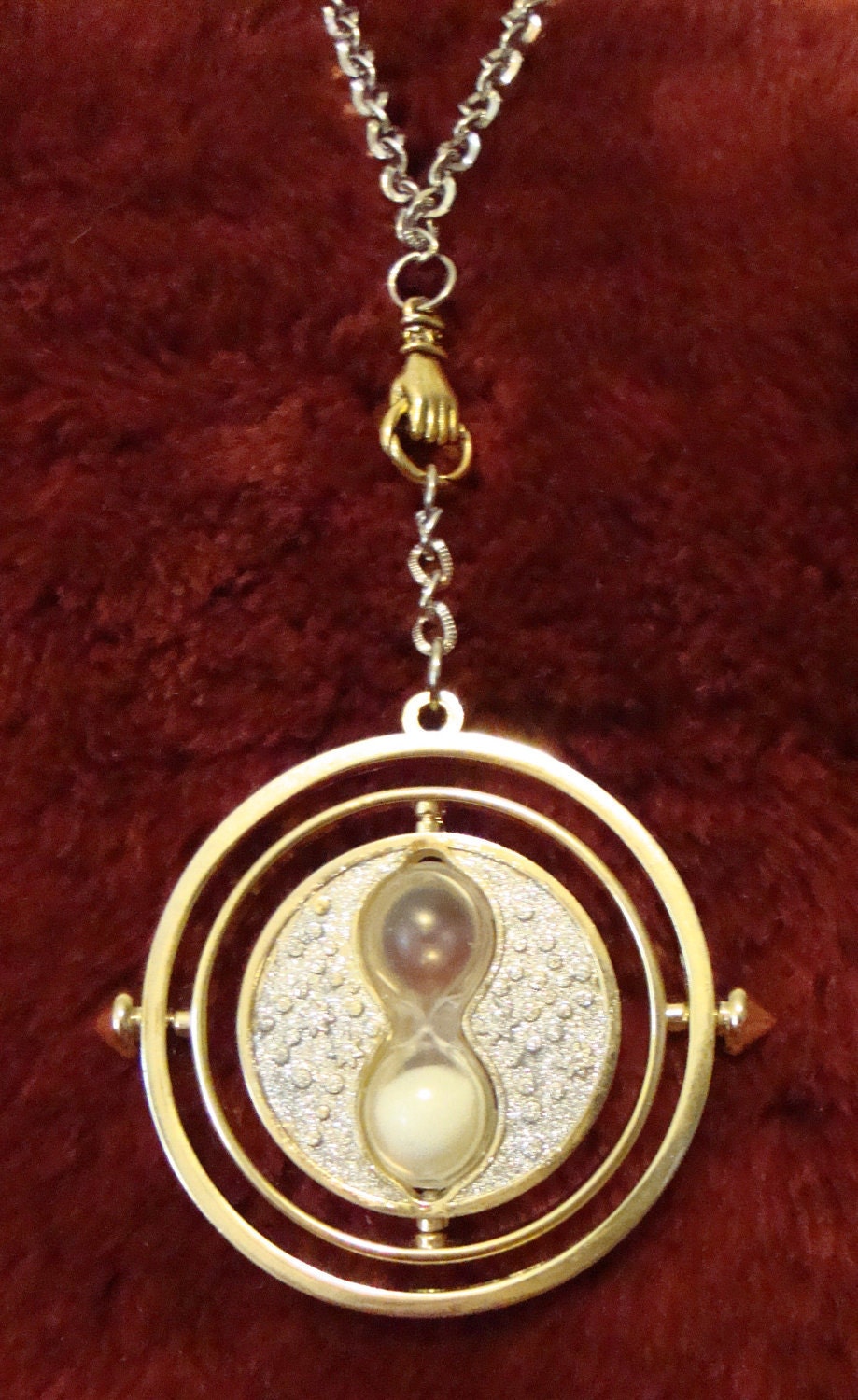 Harry Potter Spinning Time Turner Necklace at Mighty Ape NZ Harry Potter Spinning Time Turner Necklace at Mighty Ape NZ