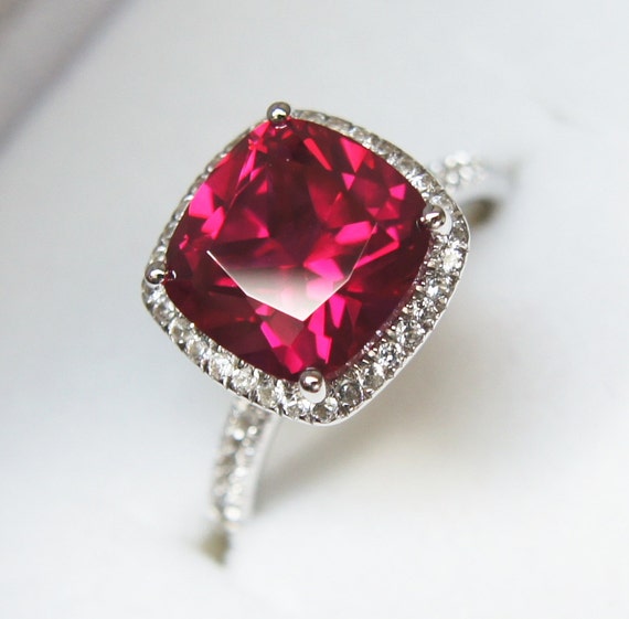 Red ruby halo ring engagement ring or right-hand ring