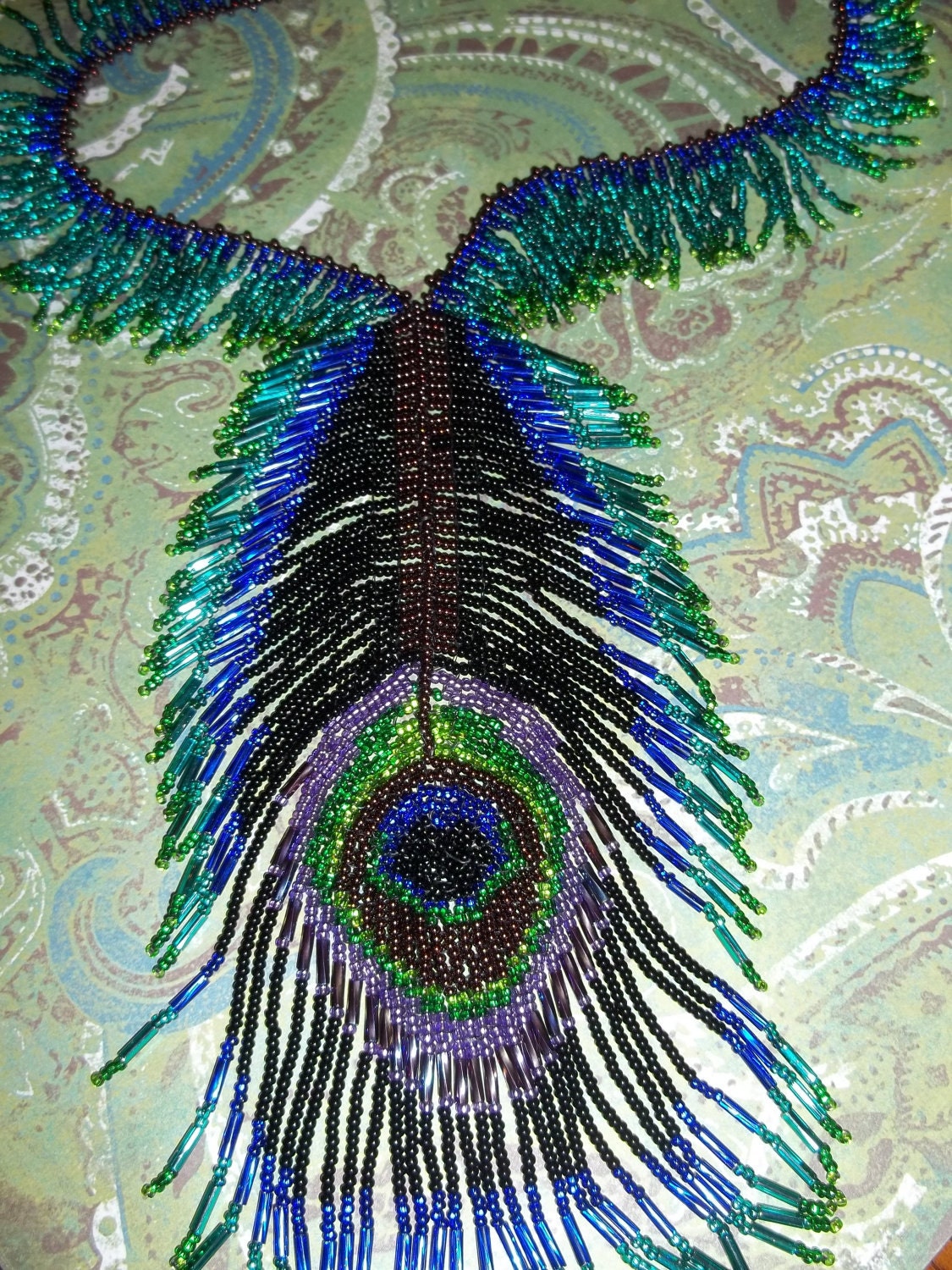 Items similar to Beaded Peacock Feather Necklace on Etsy