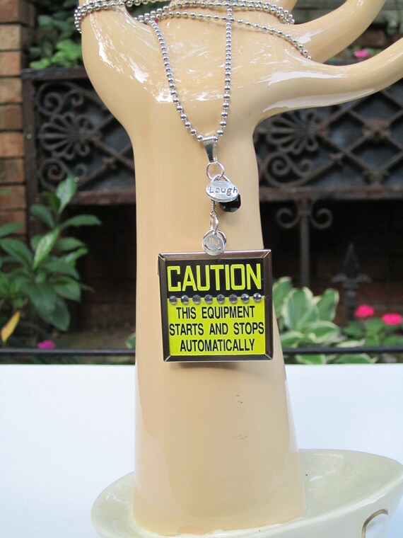 Reversible Funny Caution Pendant