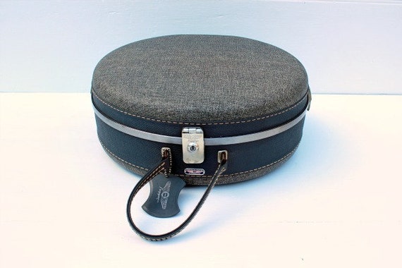 vintage american tourister round luggage