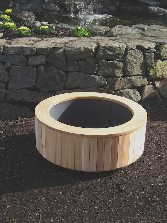 large circular wood planter by alluvion on Etsy