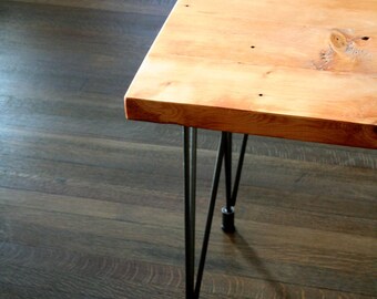 modern reclaimed industrial bench with steel leveling hairpin legs