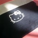RUMMAGE SALE - Hello Kitty upcycled zip-up mini-bag
