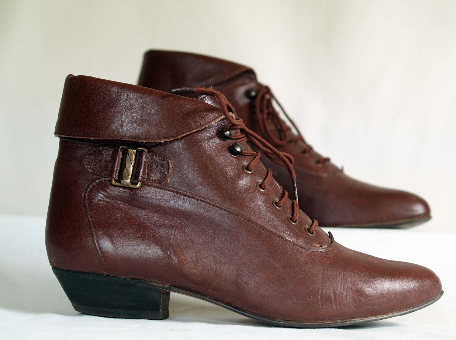 vintage ankle granny boots. fold down cuff. lace up hooks.