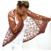 Cobweb Cocoon Shrug in Brown.