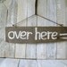 Sign recycled wood over here