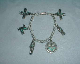 vintage antiqued silver tone faux turquoise native american themed charms bracelet