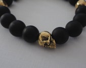 Black Onyx Double Skull Bracelet for Men with Brass Accents
