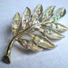 Vintage Aurora Borealis Rhinestone Brooch, Gold Leaf