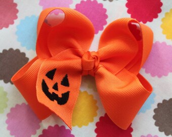 Halloween Bow -- Pumpkin Bow -- Large Orange Boutique Bow embroidered with jack-o-lantern - Choose 4-5" or 6-7"