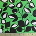 Laughing Leaf on Green Fabric YARD
