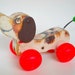 snoopy wooden pull toy