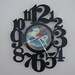 vinyl record clock (artist is The Steve Miller Band)