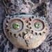 Owl spooky steampunk bronze necklace, barn owl with gears and peridot gemstones