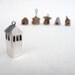 Silver geometric Hidden Heart tall watchtower, made from recycled silver with heart hidden inside