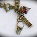 Strawberry Letter - Vintage style antiqued brass charm bracelet