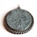 Marble Encased in Dark Silvery Metal Oval Pendant