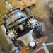 Reserved Monte Blanc bot - found object robot sculpture assemblage