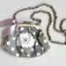 Wedding day. Summer fashion. Grey and white polka dot purse.