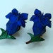 Reserved for Kimmie- Do Not purchase- Vintage Blue Iris earrings carved plastic clip on