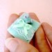 Tiny cat and mint green bed - with posable jointed neck