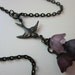 Bouquet - Victorian swallow bird charm, bouquet of rose and lilac lucite flowers, and antiqued black brass necklace