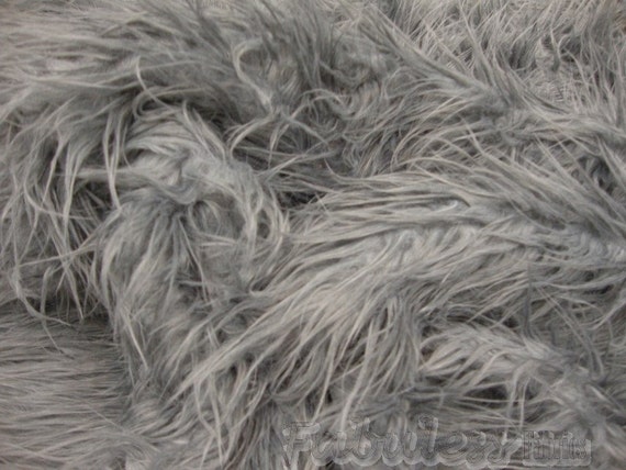 Items similar to Grey Mongolian shaggy faux fur fabric per yard on Etsy