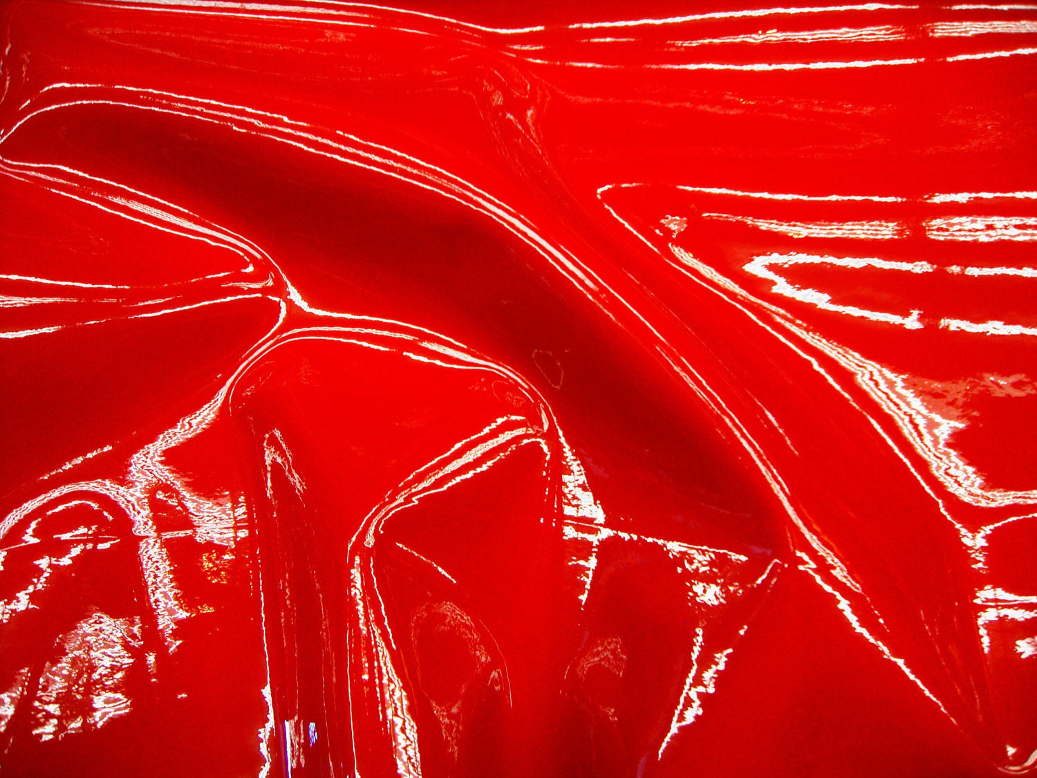 Red patent faux vinyl upholstery fabric per yard