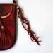 African leather pouch, red with black decoration
