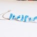 Blue and White Zebra Print Ribbon Bow Ear Cuff (Pair)