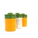 Empty Kodak Kodachrome metal film canisters