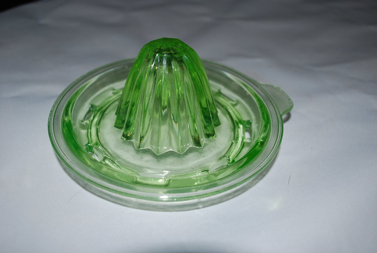 Green glass lemon squeezer by csandate on Etsy