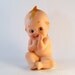 Vintage Kewpie Bisque Figurine - KW228 Sitting with Thumb