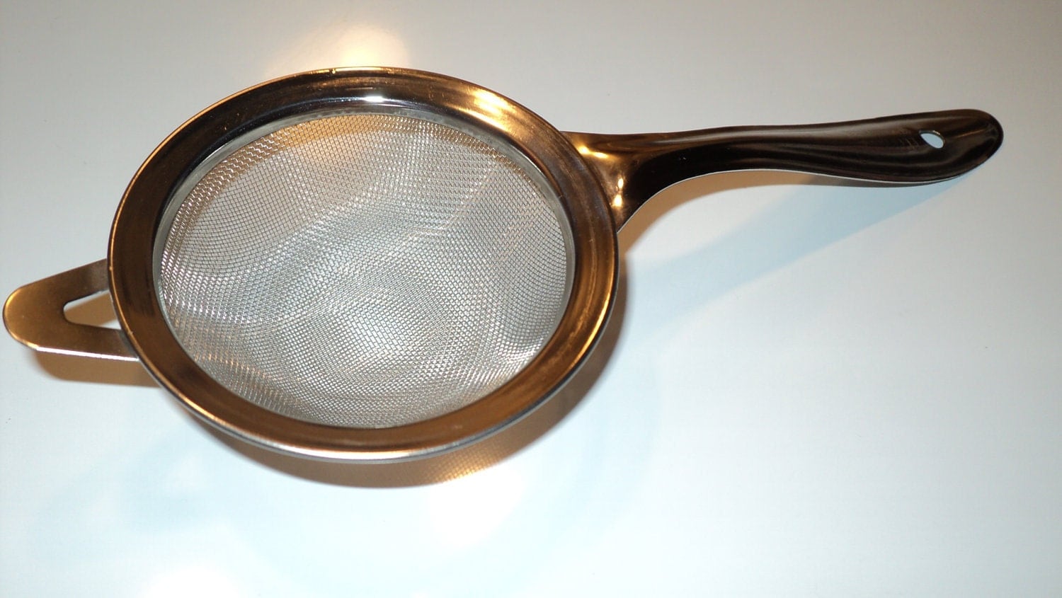 Classic fine mesh stainless steel Chai tea strainer.