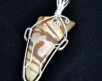 Owyhee jasper stone pendant. Sterling Silver wire wrapped.