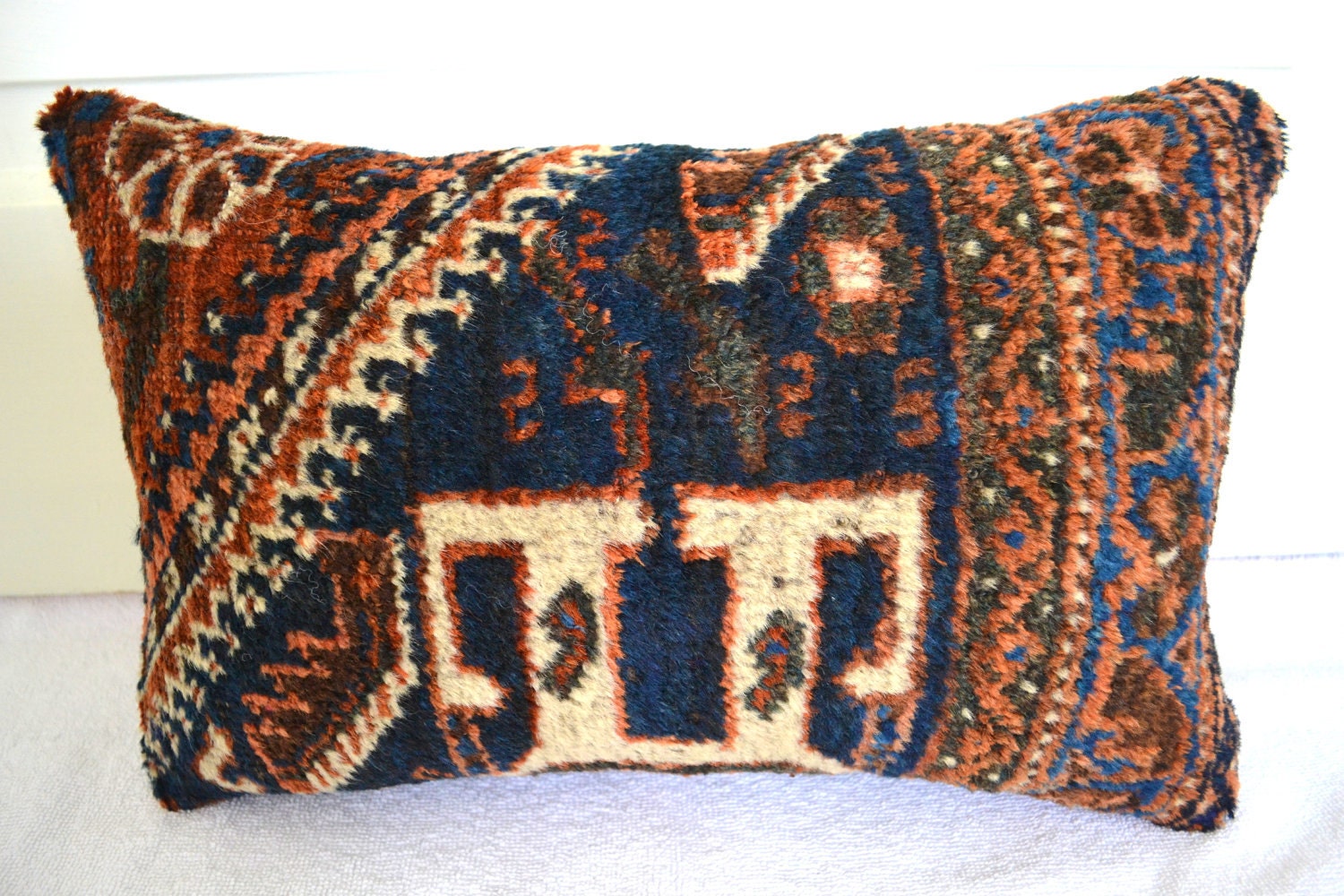 pillows oriental rug leather sofa