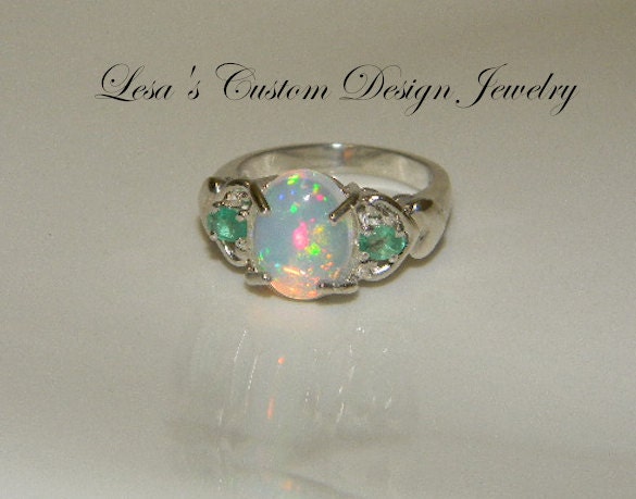 Opal and emerald engagement rings