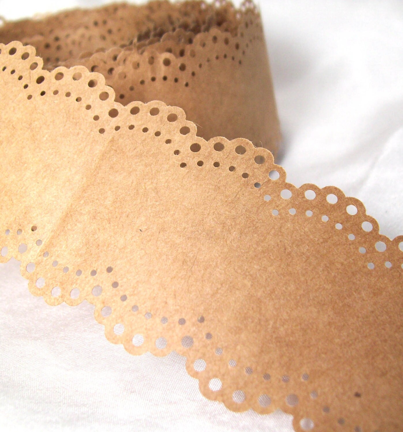Kraft paper lace eyelet edge 1 and 1/2 inches wide recycled
