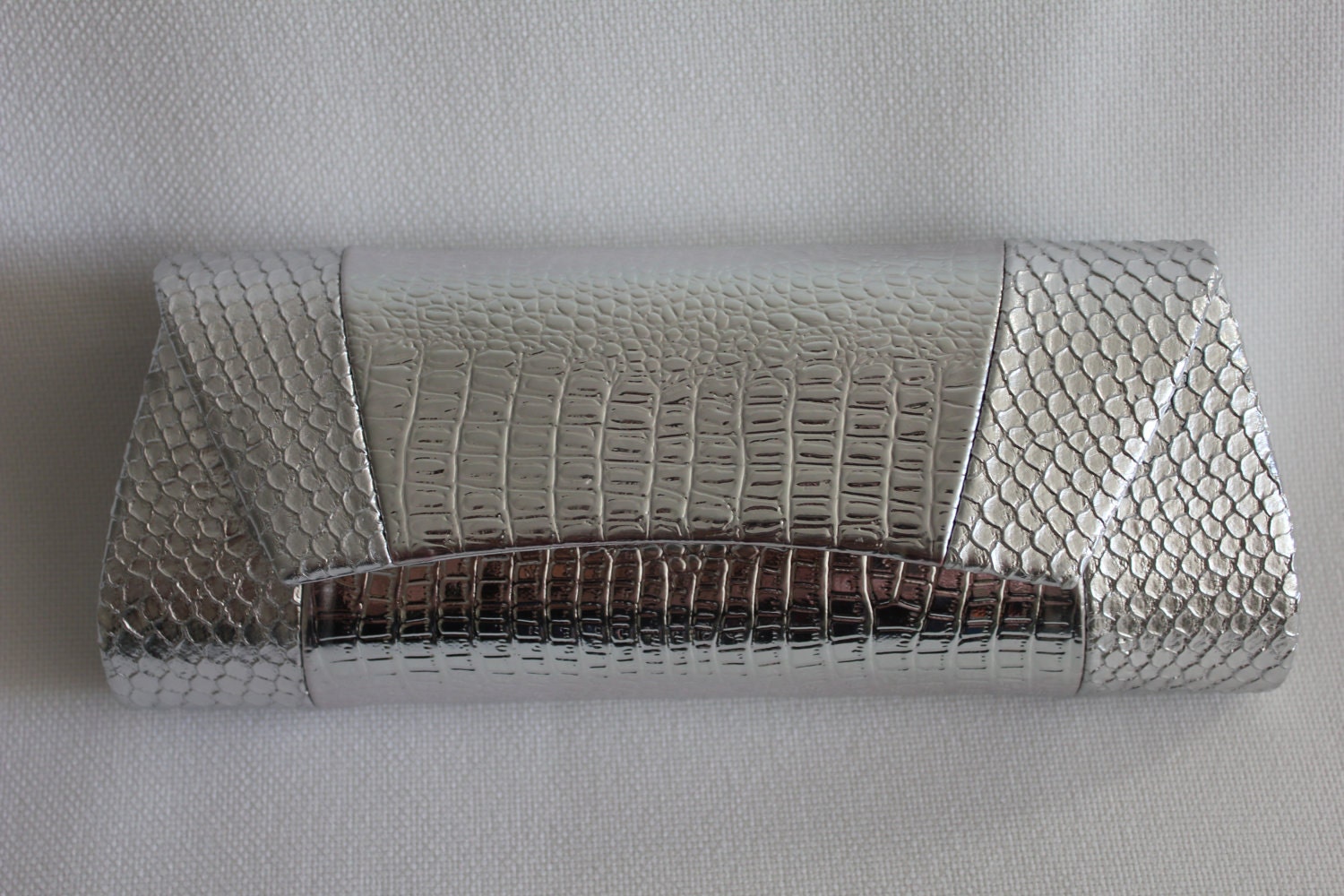 silver snake clutch bag