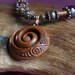 Bone Koru necklace. Handcarved with freshwater pearls & Copper