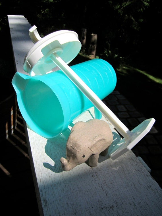 Turquoise Plastic 2 QT Pitcher plunger with tight fitting lid