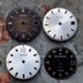 Lot of 4 vintage watch faces.