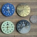 Lot of 4 vintage watch movements with dial.
