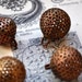 Set of 4 Vintage copper buttons.