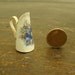 miniature vintage jug with flowers