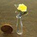 vase with yellow roses