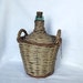 Vintage demi-john in blue green glass, marked V Ayelense