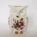 Bone china owl, made in England, with floral decoration
